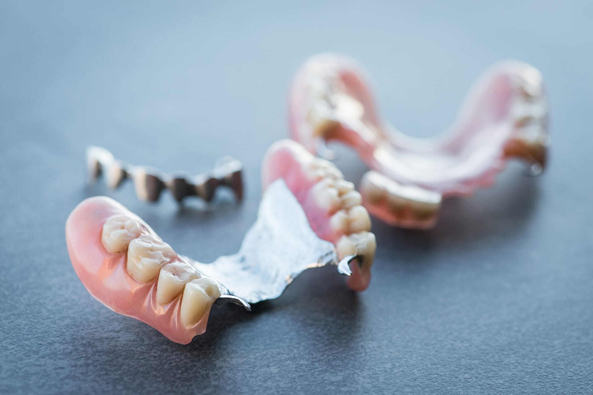 The Pros and Cons of Partial Dentures, Explained